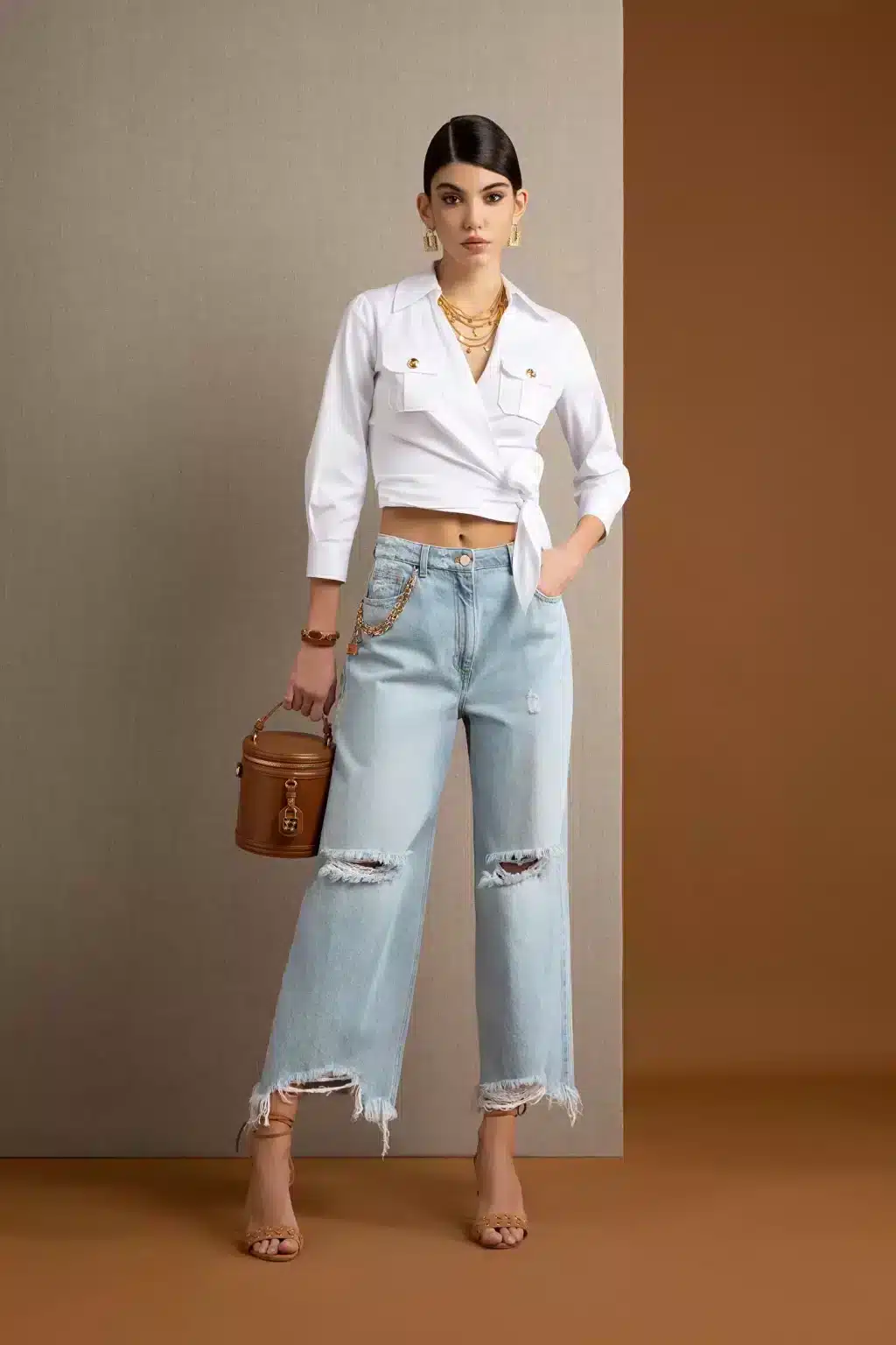 Spring summer 2022 ELISABETTA FRANCHI CROPPED JEANS WITH RIPPED DETAILS