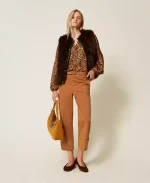 New collection TWINSET SLEEVELESS FAUX FUR COAT WITH BUTTONS