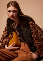 New collection TWINSET SLEEVELESS FAUX FUR COAT WITH BUTTONS