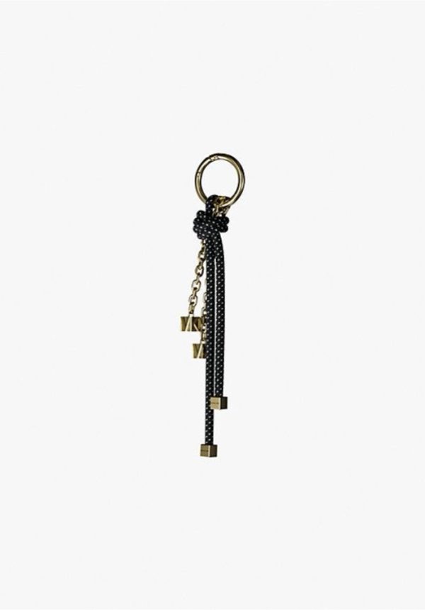 New collection MICHAEL KORS GOLD TONE AND SPECKLED CORD BAG CHARM