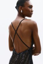 Clothes ALLURE EVENING GLOW SLEEVELESS MESH MINI DRESS WITH DEEP V-NECKLINE AND FRINGED HEM FOR A BOLD AND GLAMOROUS LOOK.